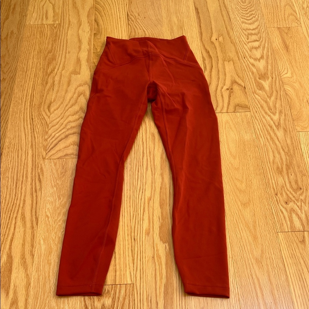 Lululemon SZ 2, Cayenne high rise leggings 25”.